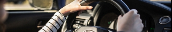 Woman driving her car.