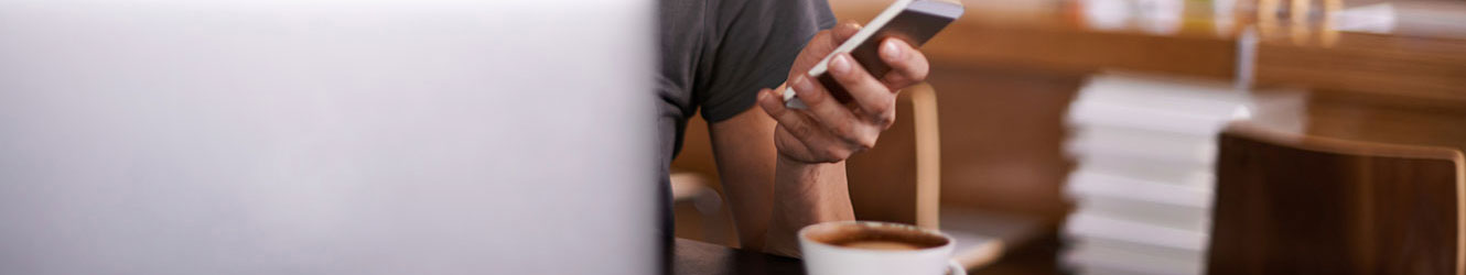 Young woman shopping from home on computer.