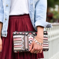 Woman holding her handbag.